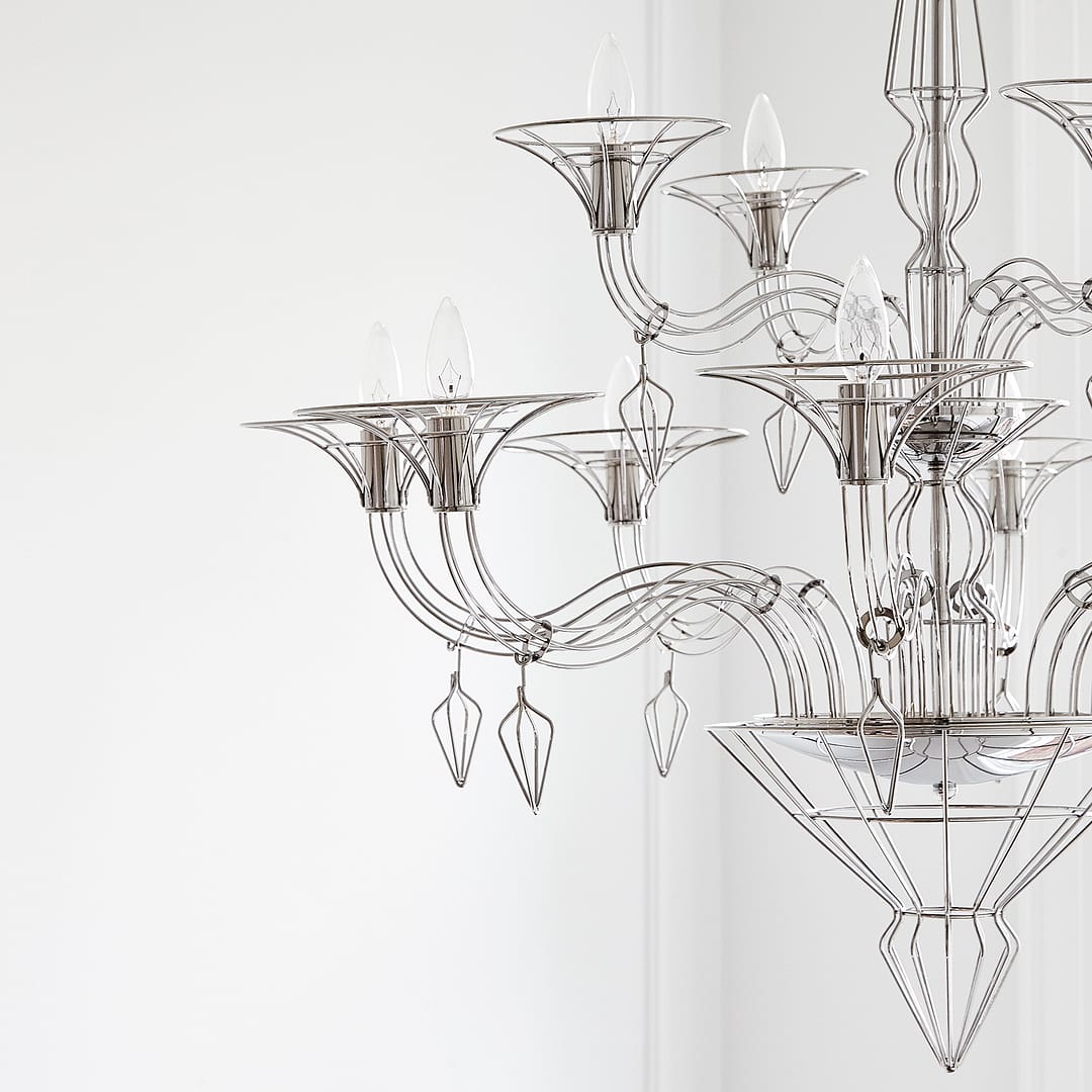Elegant modern chandelier with intricate design, creation of House of Layth."